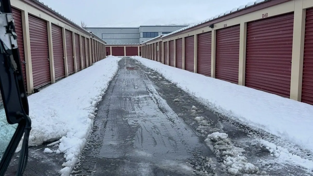A storage facility aisle plowed clear of snow