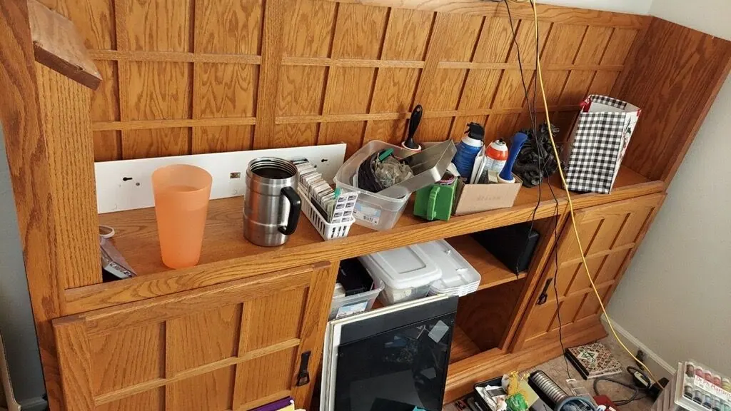 Kitchen cabinets and shelves full of leftover items