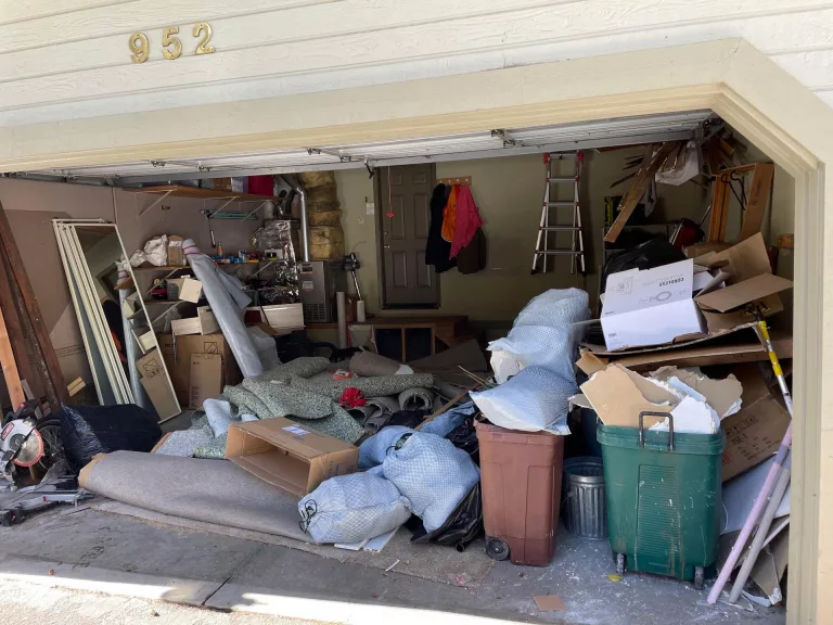 garage full of unwanted items ready to be cleaned out by Reno Tahoe Junk Removal